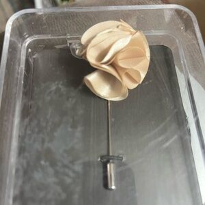 J Ferrar - flower lapel stick pin .